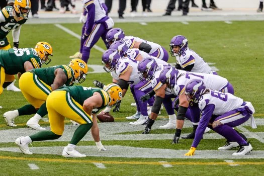 The Vikings offense preparing to take a snap against the Green Bay Packers defense