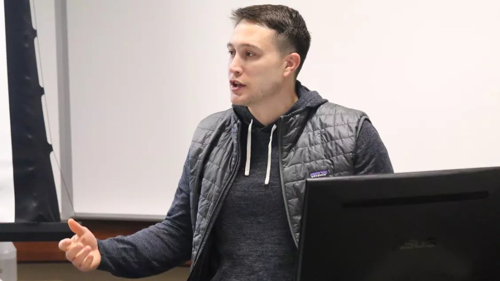 Nolan Teasley as the Assistant General Manager of the Seattle Seahawks